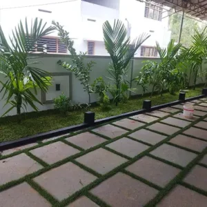 Earthwings – Best landscaping company in Kerala showcasing a modern and stylish living room interior design.